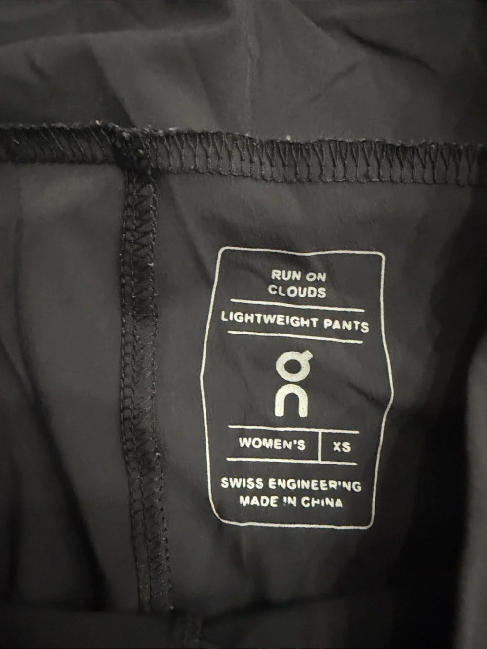 On Running Women's Black Track Joggers with Reflective Logo